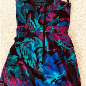 Mini dramatic with color dress